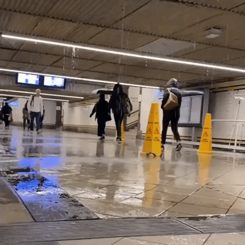 Heavy Rain From Ex-Cyclone Causes Flooding Inside Melbourne's Flinders Street Station