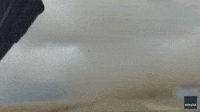 Debris Flies as Funnel Cloud Swirls in Kendall, Kansas