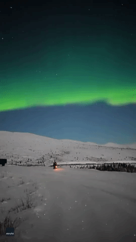Fireworks and Bright Aurora Light Up Alaskan Sky for New Year's
