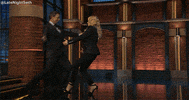 kate mckinnon hug GIF by Late Night with Seth Meyers