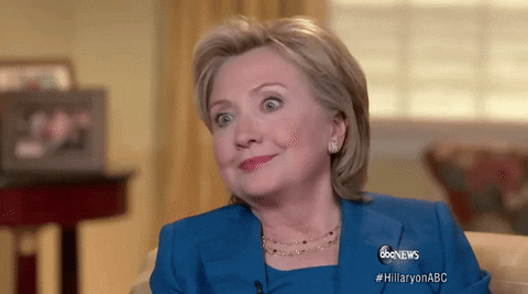 Celebrity gif. Hillary Clinton, in a TV interview with ABC News, nods slightly as she looks intensely at the interviewer.