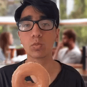 Eating glazed donut