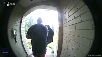 'Ow!' Doorbell Camera Shows Atlanta Man's Quick Recovery After Slipping Down Wet Stairs