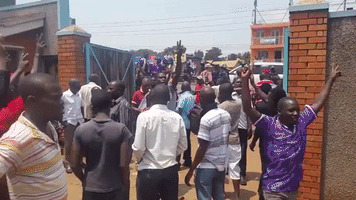 Police Fire Tear Gas and Storm Offices of Opposition Candidate Kizza Besigye