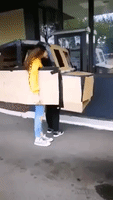 Mom and Daughter Build Cardboard Car to Use at McDonald's Drive-Thru