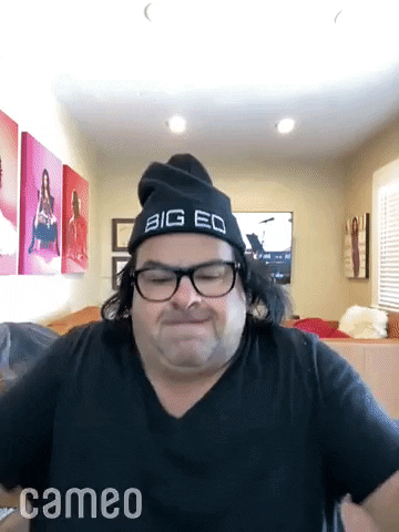 Reality TV gif. Big Ed of 90 Day Fiance emphatically claps while wearing his own merchandise. 
