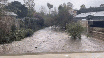 Creek Spills Over Bridge as Rain Lashes Santa Barbara