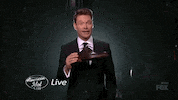 ryan seacrest drop GIF by American Idol