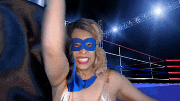 ComedianHollyLogan mask boxing hero fighting GIF