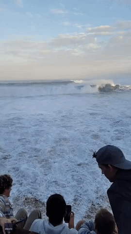 Spectator Rescued at Oahu Surf Competition After Rip Current Traps Her Under Log
