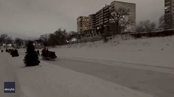 Frozen River Can't Stop Winnipeggers From Getting in Rowing Practice