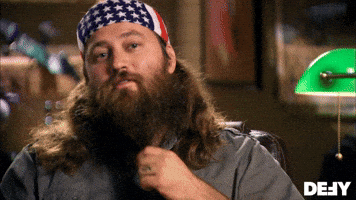 Reality TV gif. Willie Robertson on Duck Dynasty smugly tilts his head up, lifting his eyebrows, and says, “I’m looking forward to it.”