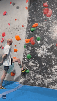 Climber Scales Wall in Impressive 'No-Hands' Challenge