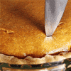 filling pumpkin pie GIF