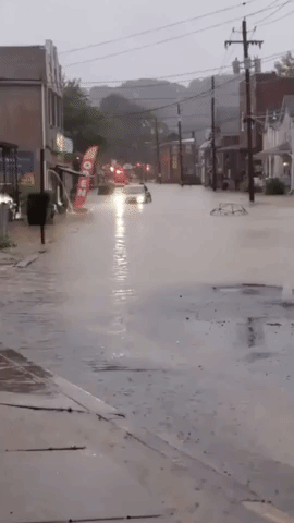 Car Caught in Floodwaters in Pittsburgh Suburb as Storm Ida Continues Trek North