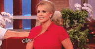 Celebrity gif. Britney Spears is on the Ellen Show. She reactions to something that makes her face scrunch up cringing, her chin tucking inwards and her lips frown on loop.
