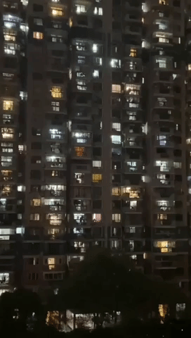 Locked-Down Shanghai Locals Shout Encouragements From Their Windows