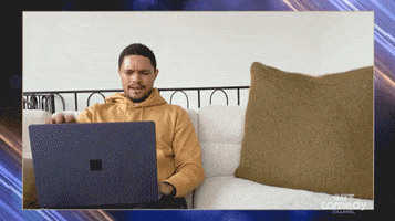 Celebrity gif. Trevor Noah sits on a couch and closes his computer exhausted. Text, "Finally, the week is over." He moves to the other end of the couch and opens his computer excitedly. Text, "It's the weekend baby!"