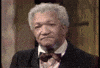 Video gif. Group of bummed men sitting side by side in a line. One man shakes his head with a frown on his face and looks at the next man who has a confused look on his face. The camera pans to two more men, one looks worried and the other is frowning disappointingly with tears in his eyes.