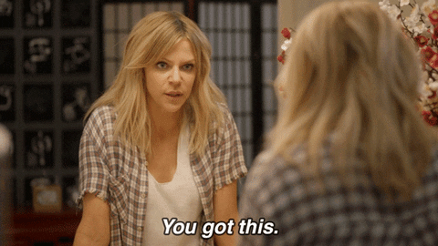 TV gif. Kaitlin Olson as Mackenzie on The Mick. She stares at herself in the mirror and takes deep breaths as she nods and says, "You got this."