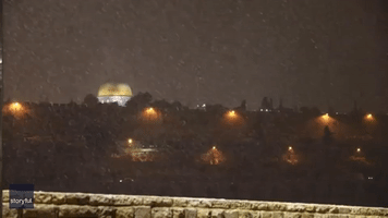 Jerusalem's Old City Blanketed in Snow After Cold Weather Sweeps Region