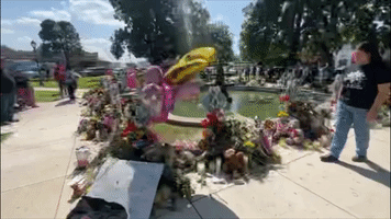Flowers Left at Memorial for Shooting Victims in Uvalde Town Square
