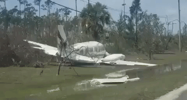 Boat, Airplane Pushed Onto Roadways in Freeport by Hurricane Dorian