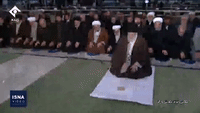 Iranian President's Swift Exit From Khamenei-Led Prayers Raises Questions