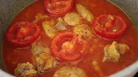cooking tomato and meat GIF