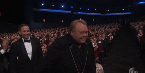 Stand Up Smile GIF by Emmys