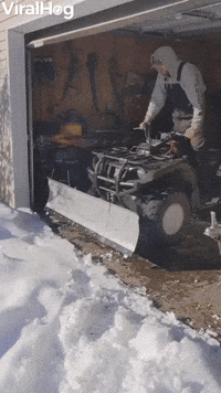 Guy Hits His Head on Garage Door