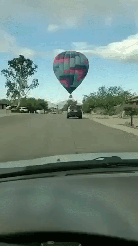 'That's a Fail!' Arizona Motorist Watches Hot-Air Balloon Hit Tree