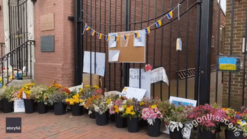 Flowers, Flags and Messages of Support Left Outside Ukrainian Embassy in DC