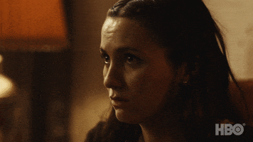 TV gif. Maude Apatow as Lexi Howard in Euphoria covers her mouth with her hand in dramatic shock and dismay.
