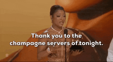 Celebrity gif. Victoria Monet's acceptance speech at the 66th Grammy Awards. She holds a grammy with a gracious and sincere expression as she speaks. Caption, "Thank you to the champagne servers of tonight." Text flashes, "Best New Artist, Victoria Monet."