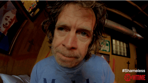TV gif. Actor William H Macy as Frank of Shameless stands up from bed, teeters groggily, then falls to the floor with a look of terrified surprise on his unshaven face. 