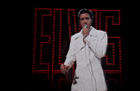 elvis presley singing GIF