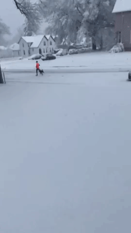 Jogger Runs in Snowy Southeast Iowa Amid Winter Storm Warning