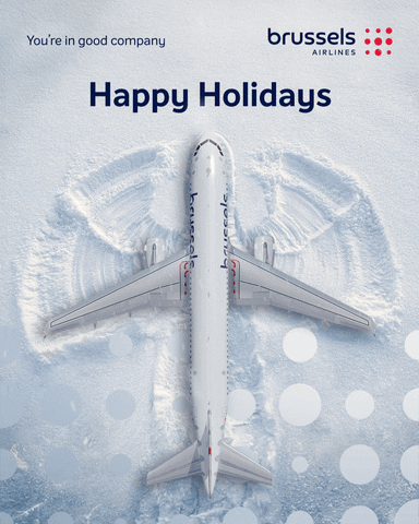 Ad gif. An Airbus A320 from Brussels Airlines spreads its wings out to make a snow angel. Text reads, "You're in good company. Happy Holidays." The Brussels Airlines logo rests in the top right corner. 