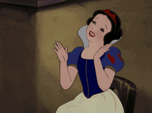 Disney gif. Snow White claps and sways as if listening to music.