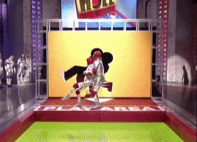 hole in the wall toss GIF by The Human Tackboard
