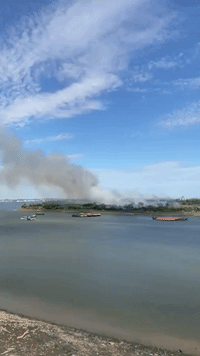 Large Plume of Smoke Looms as Grass Fire Burns in Thamesmead