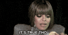 Video gif. Wearing a gray outfit with pronounced shoulders, a woman resembling Janet Jackson eats a Pringle, then looks to left of frame and bobs her shoulders. Text, "It's true tho."