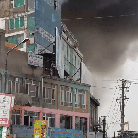 Man Jumps From Burning Building in Kabul's Kote Sangi Neighborhood