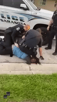 'I'm Not Resisting!': Officer Filmed Kneeling on Man's Neck and Head During Detainment