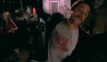 andrew w k fist pump GIF