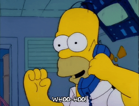 The Simpsons gif. Holding a phone to his ear, Homer throws a fist into the air and closes his eyes in celebration, yelling, “Whoo-hoo!”