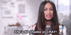 Reality TV gif. Tami Roman from Basketball Wives gives a side-eye and says, "She's fifty shades of cray!"