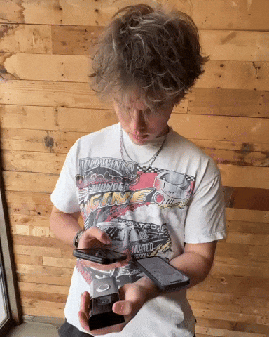 Shocked 2 Phones GIF by Respective