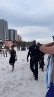 Clearwater Police Officers School Spring Breakers in Beach Football